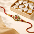 Kundan-Style Rakhi with Kaju Katli Style Sweets